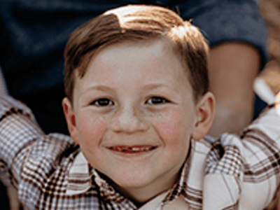Children smiling into the camera